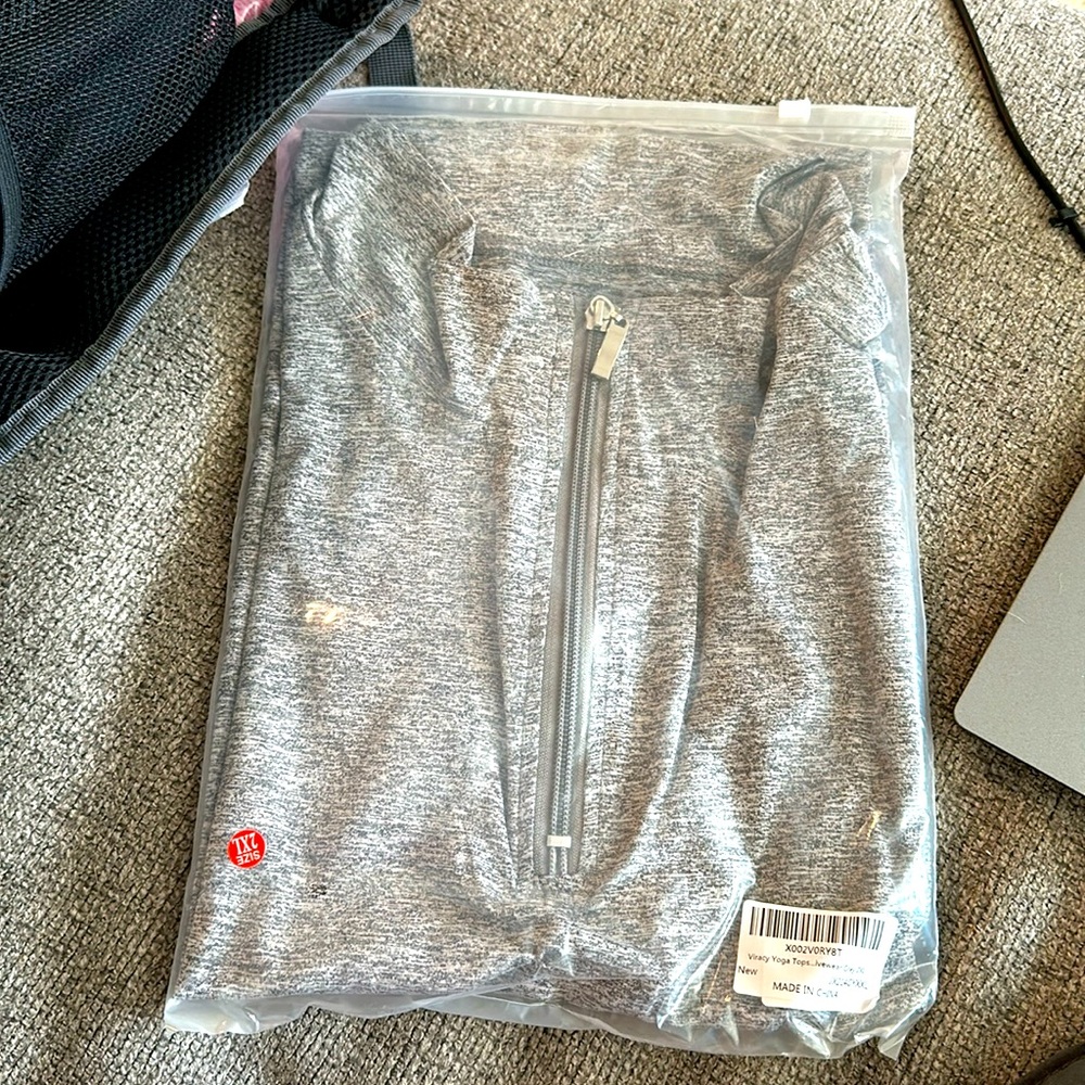 never opened grey golf tank
